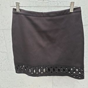 Black Mini Skirt with circle cutouts Size M